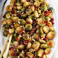 These Pomegranate Glazed Brussels Sprouts are savory, sweet and roasted to perfection making them the perfect holiday side dish for your table this season!