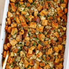 This Sausage, Apple and Herb Stuffing combines sourdough bread with a delicious mixture of sweet apples and savory sausage, onion, celery and fennel along with fresh herbs for the perfect Thanksgiving side dish your whole family will love!