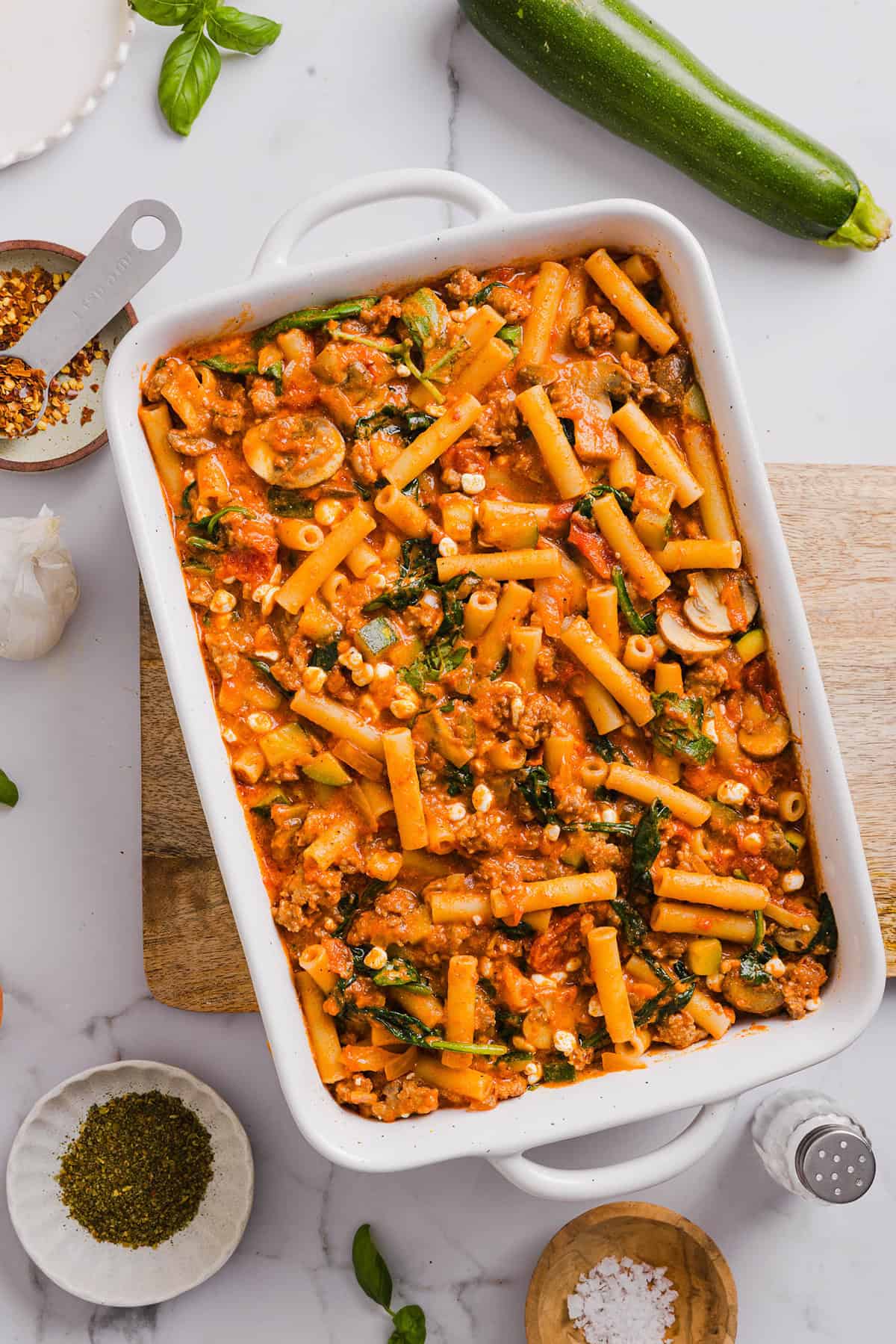 Comforting and delicious Healthy Baked Ziti packed with veggies, flavorful turkey sausage and makes the perfect weeknight meal the whole family will love! Leftovers guaranteed!