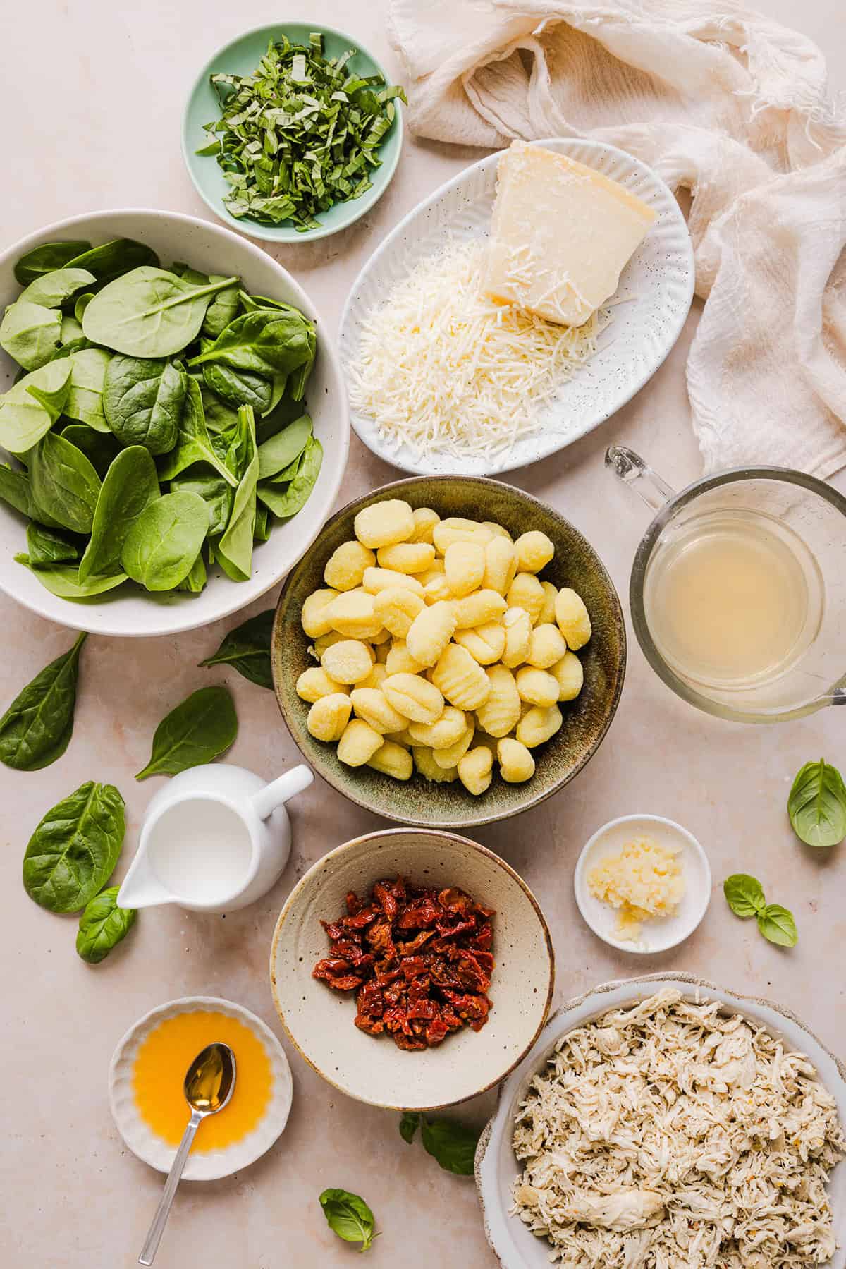 This EASY One Pan Marry Me Chicken and Gnocchi is the perfect weeknight meal! Pillowy soft gnocchi and tender chicken simmered together in a creamy sun dried tomato and parmesan sauce in just 20 minutes!  