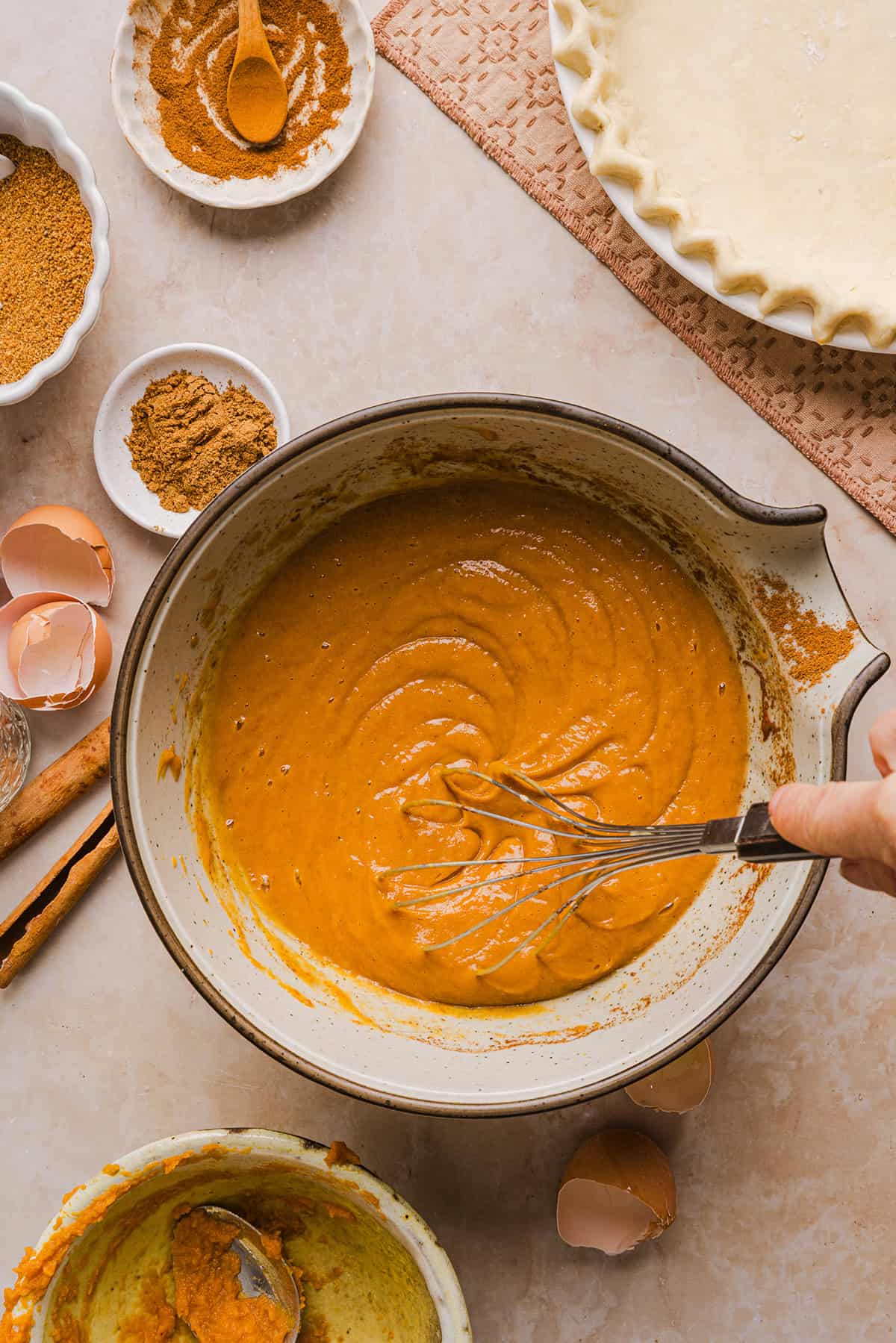 This creamy and delicious Healthy Pumpkin Pie makes the perfect holiday dessert! So easy to make, naturally sweetened with maple syrup and tastes great topped with whipped cream or vanilla ice cream!