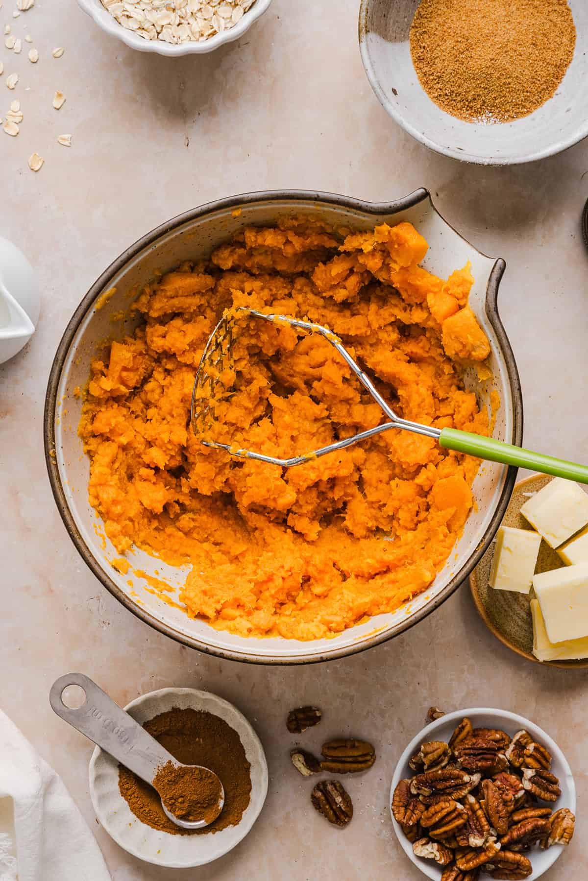 This Healthy Sweet Potato Casserole is a family favorite! A classic holiday side dish that tastes just as delicious as traditional sweet potatoes, but without any refined sugar and a wholesome pecan streusel topping!