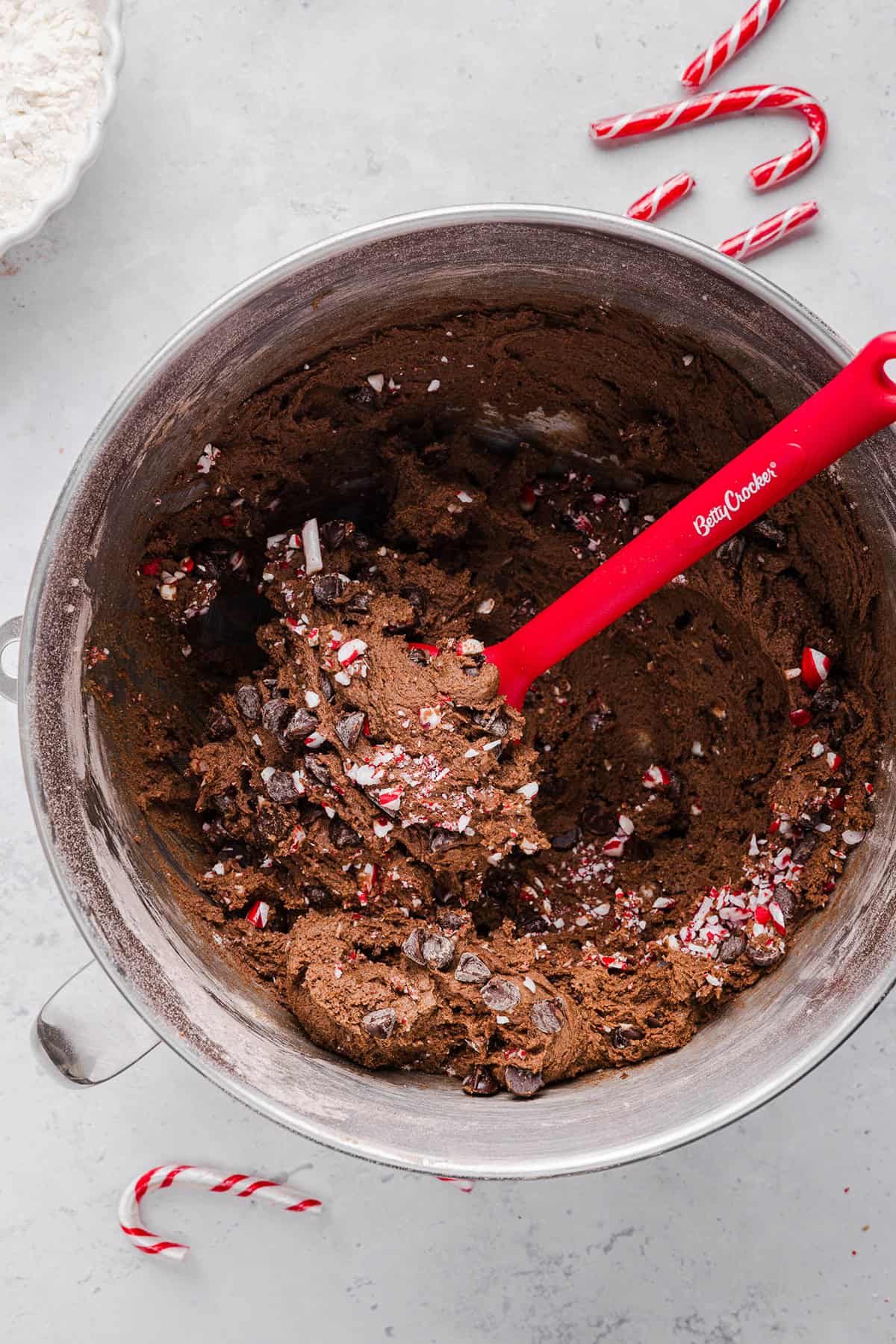 These chewy Chocolate Peppermint Cookies are rich and fudgy with a festive candy cane crunch that are so easy to make! The perfect holiday cookie made healthier with less butter, whole wheat flour and zero refined sugar.