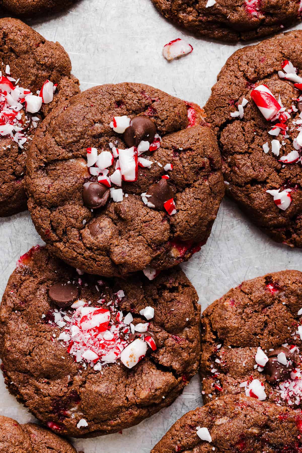 These chewy Chocolate Peppermint Cookies are rich and fudgy with a festive candy cane crunch that are so easy to make! The perfect holiday cookie made healthier with less butter, whole wheat flour and zero refined sugar.