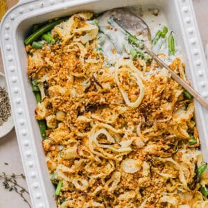 This Healthy Green Bean Casserole has all the flavor you love about the classic recipe, but made with wholesome, real ingredients. Tender green beans tossed in a homemade mushroom cream sauce and topped with crispy onions for the perfect holiday side dish!