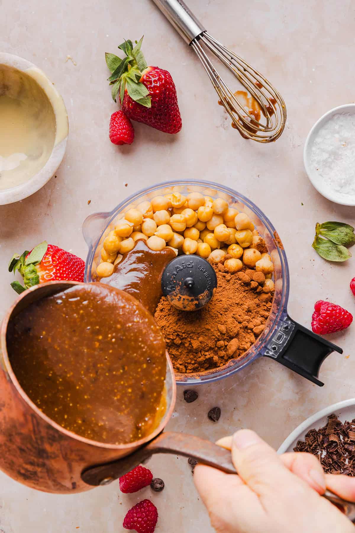 This Healthy Chocolate Hummus is rich and indulgent to satisfy your sweet tooth, but made with wholesome ingredients that you can feel good about eating! Serve with your favorite fruit, pretzels or graham crackers for the perfect fun dessert or snack!
