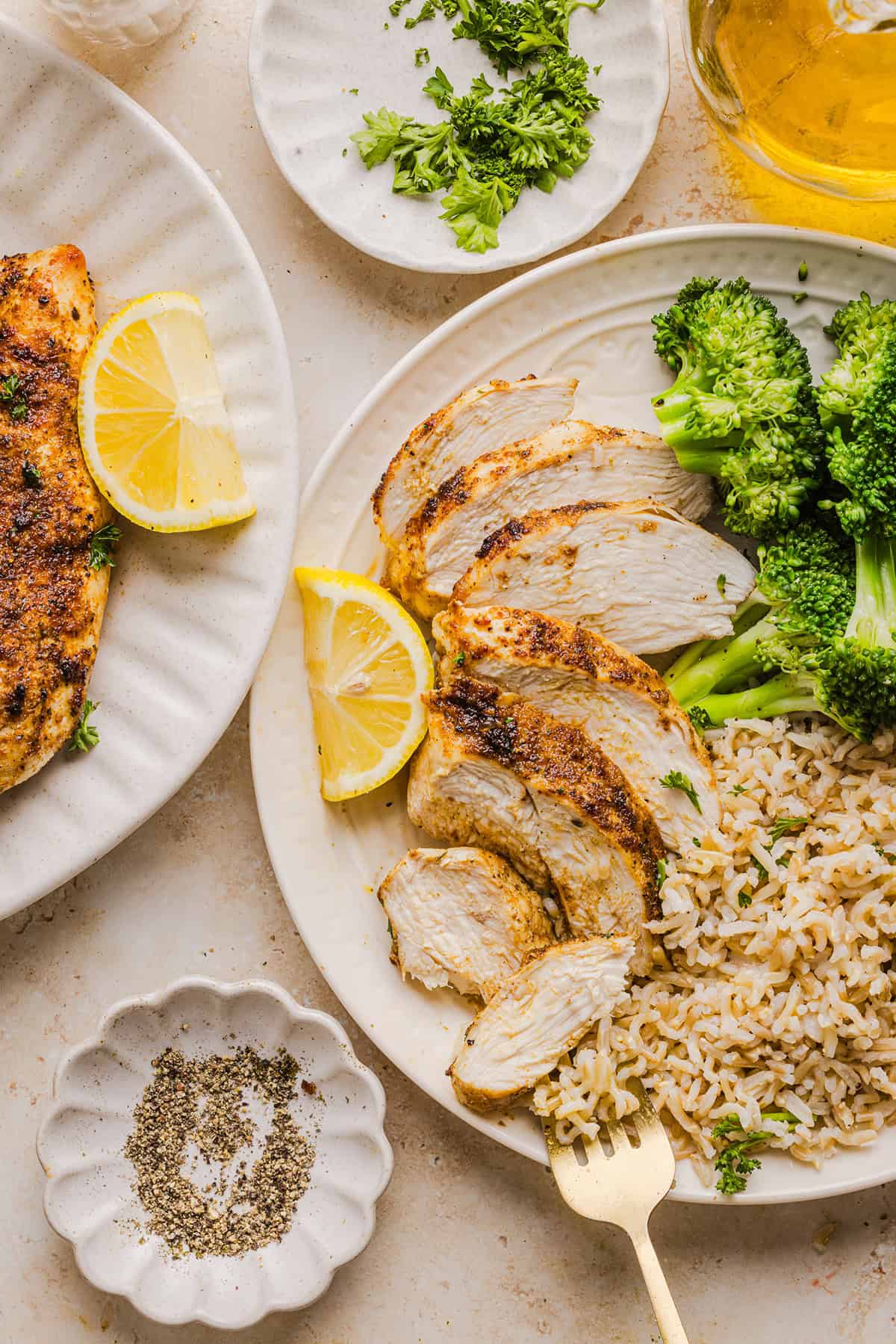 Juicy Air Fryer Chicken Breast recipe that comes out perfectly every time in just 20 minutes! Seasoned with a blend of herbs and spices for a delicious, healthy meal great for busy weeknights or when you need to meal prep.