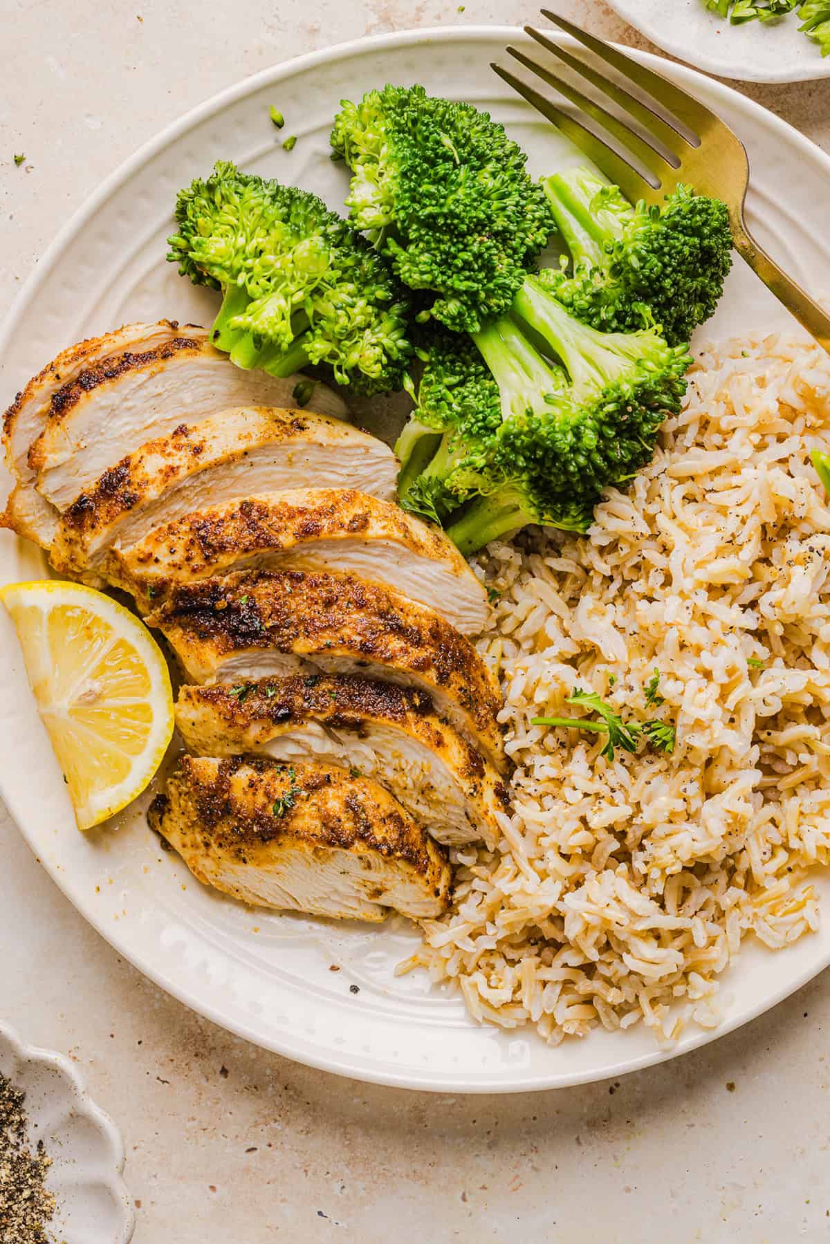 Juicy Air Fryer Chicken Breast recipe that comes out perfectly every time in just 20 minutes! Seasoned with a blend of herbs and spices for a delicious, healthy meal great for busy weeknights or when you need to meal prep.