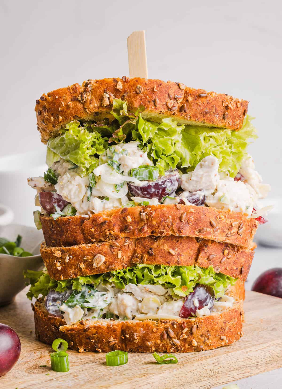 This Healthy Chicken Salad is creamy, fresh and packed with protein! Made with tender chicken, Greek yogurt in place of mayo, crunchy celery, grapes, and sliced almonds for a delicious, easy lunch or meal prep option you'll make on repeat!