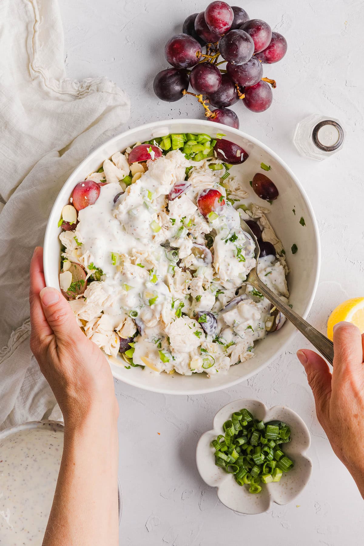 This Healthy Chicken Salad is creamy, fresh and packed with protein! Made with tender chicken, Greek yogurt in place of mayo, crunchy celery, grapes, and sliced almonds for a delicious, easy lunch or meal prep option you'll make on repeat!