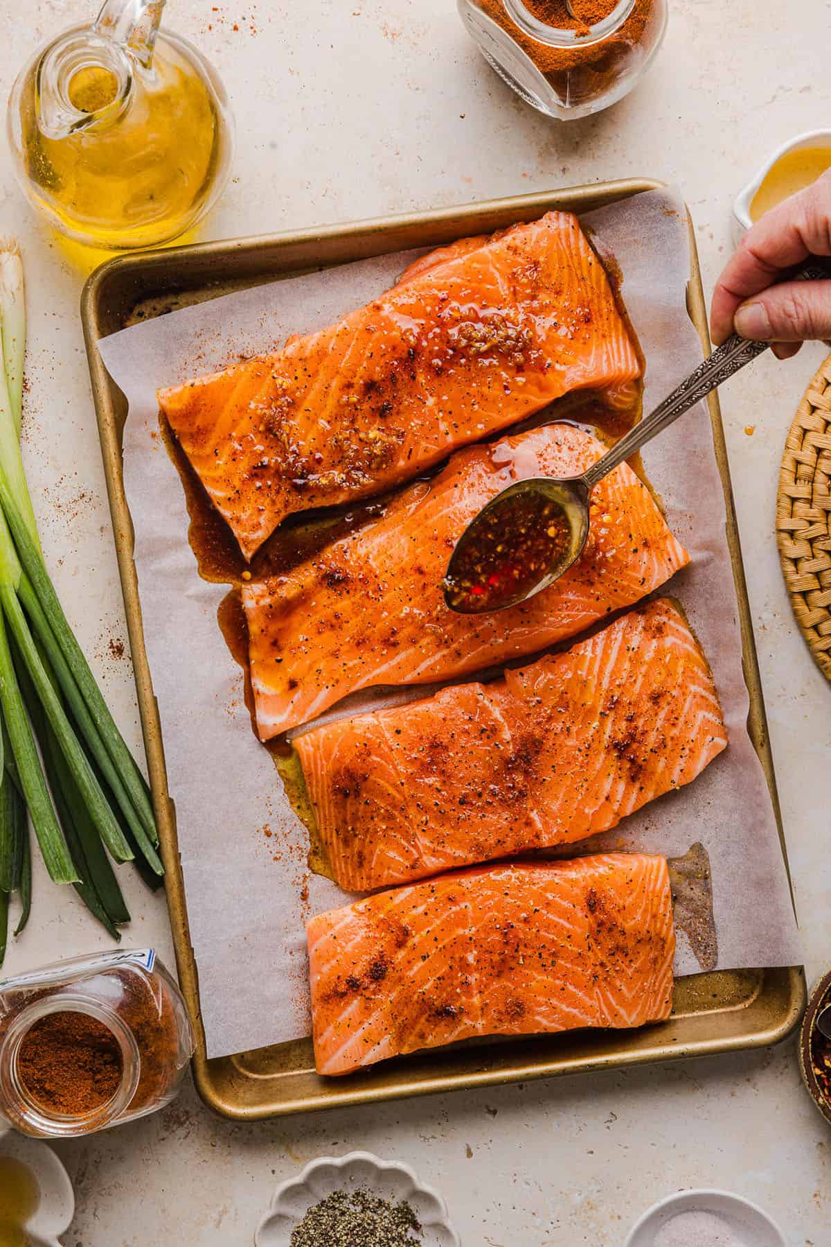 The most flavorful Hot Honey Glazed Salmon that is tender, flaky and coated in a sweet and savory homemade hot honey sauce. This simple healthy recipe easily comes together in under 20 minutes!