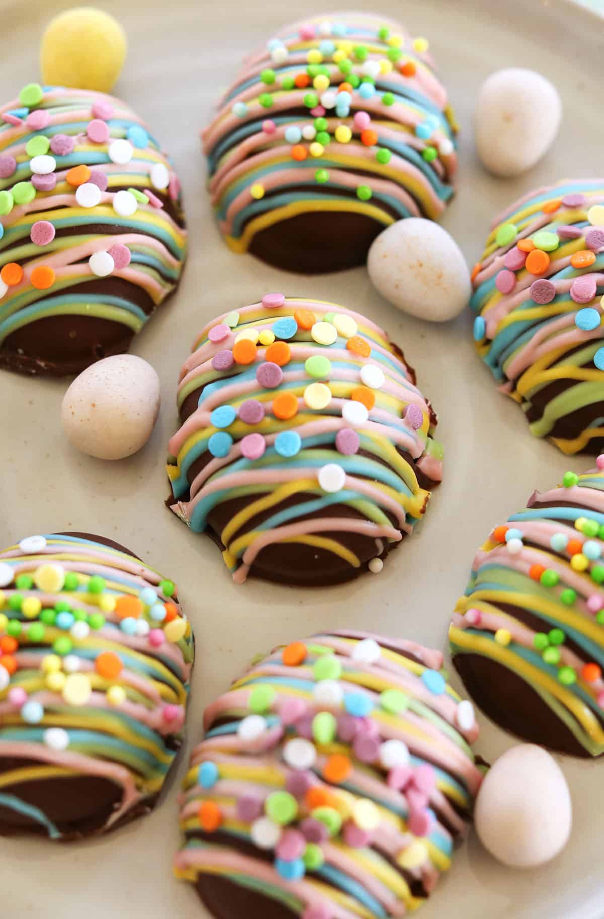 These Healthy Chocolate Peanut Butter Eggs are an easy no-bake Easter treat made with just a few simple ingredients! A healthier version of Reese's eggs that are gluten-free and refined sugar-free!