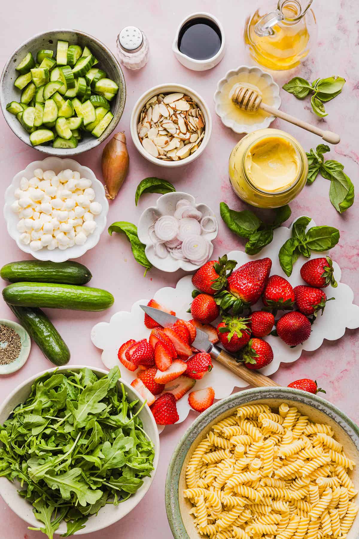This Strawberry Balsamic Pasta Salad is fresh, flavorful, and perfect for spring and summer! Made with juicy strawberries, tender pasta, fresh basil, creamy mozzarella and crisp cucumbers all tossed in a lightly sweet balsamic dressing. 
