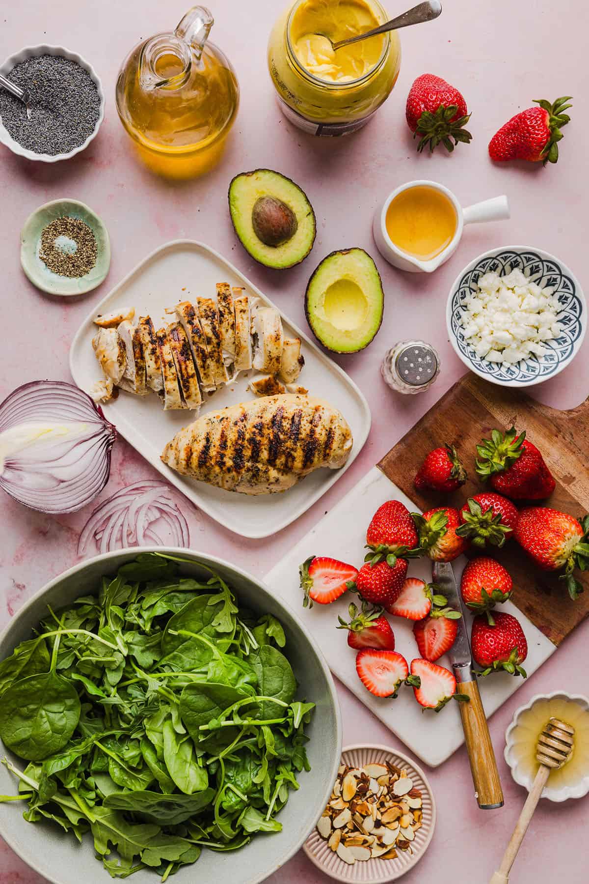 This Strawberry Poppy Seed Chicken Salad is fresh, flavorful, and perfect for spring and summer! Made with juicy strawberries, tender chicken, crunchy toppings, and the BEST poppy seed dressing.
