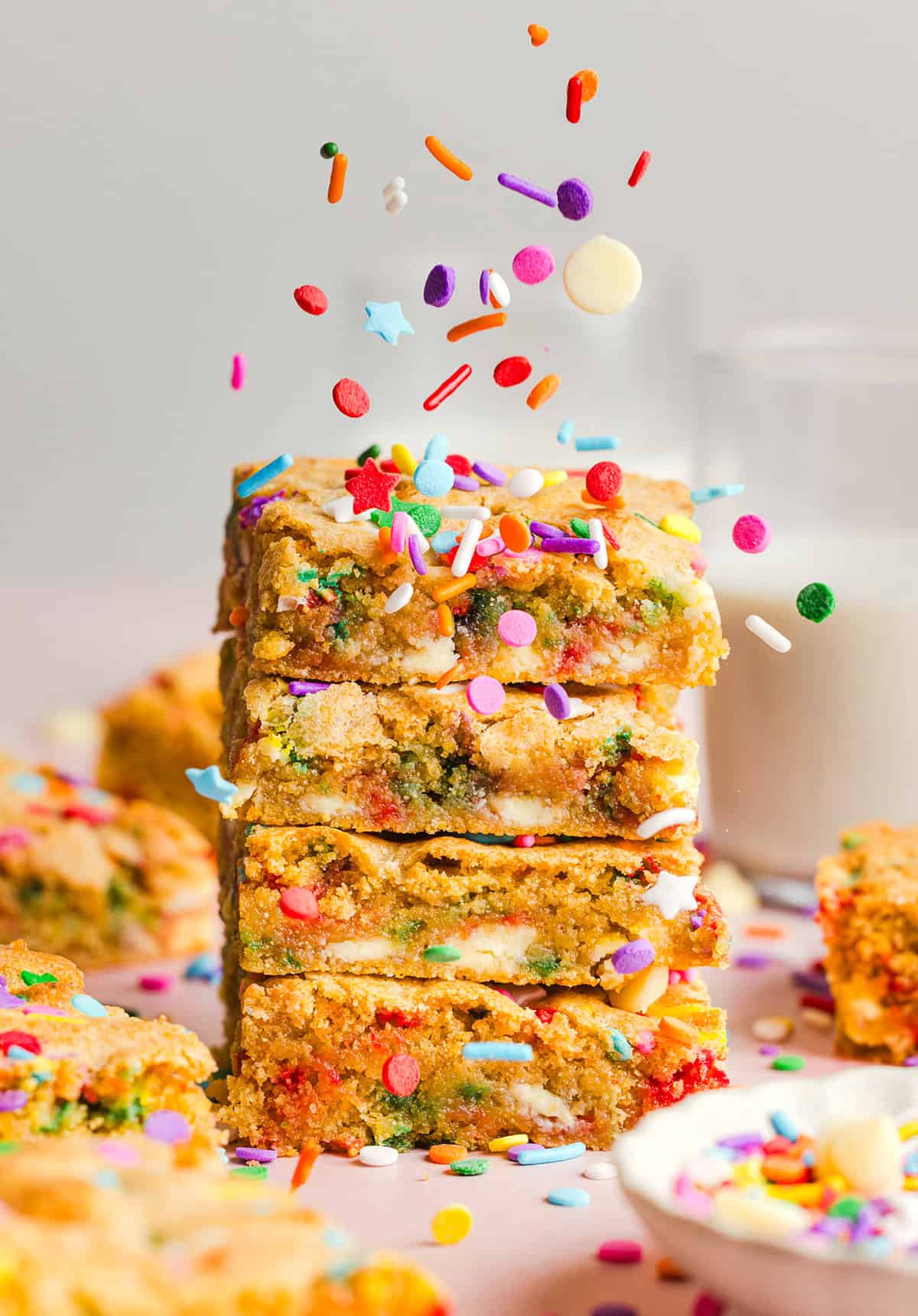Soft and chewy Healthy Funfetti Cookie Bars that taste like birthday cake batter! Made healthier with whole wheat flour, less butter and zero refined sugar for the perfect lightened-up party dessert!
